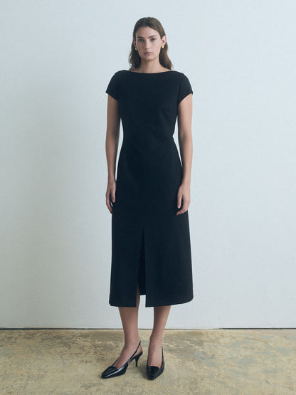 Black wool-blend boat neck dress with front slit and invisible back zipper, fully lined, made in Canada from Italian fabric by Judith & Charles.