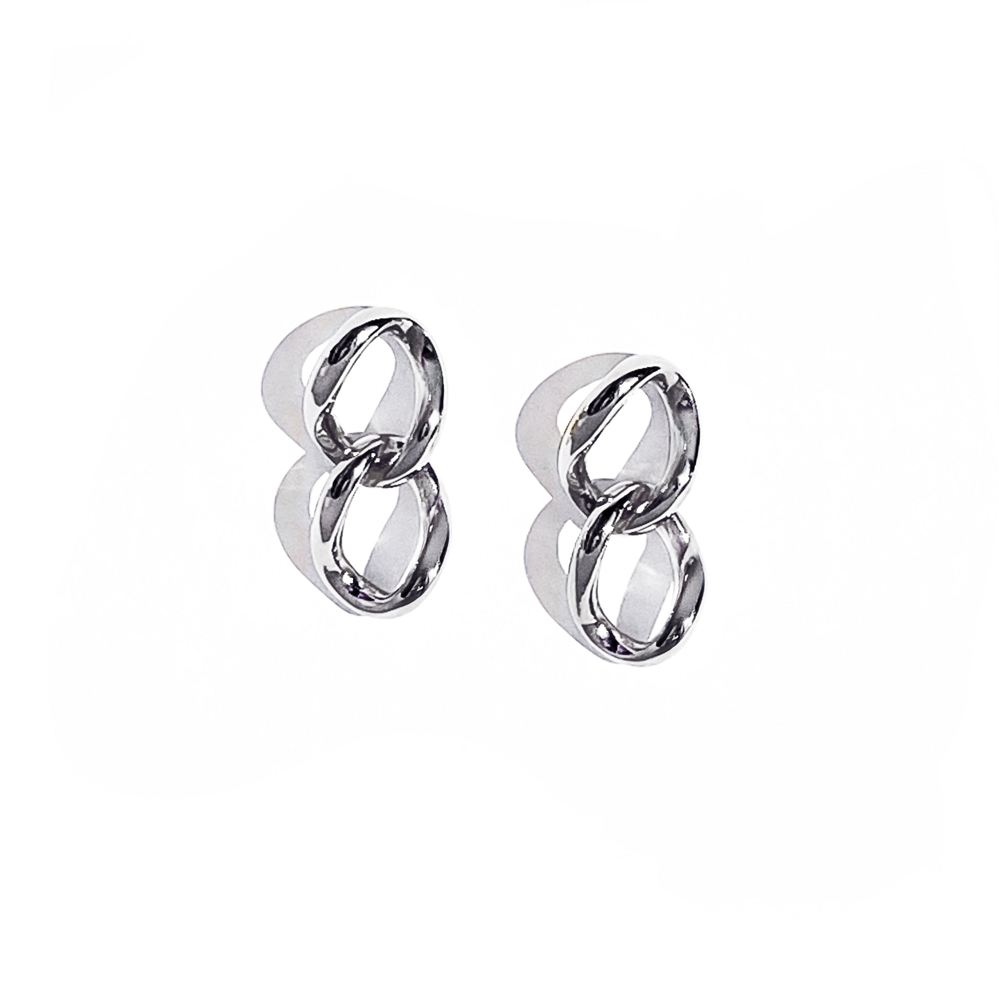udith and Charles x Biko gold silver double link earrings, hand-cast and polished, worn on model. Subtle yet strong everyday essentials with 14k gold plating and hypoallergenic posts. 0.4" width, 0.9" drop. Style BK-W2508, made in Toronto, Canada